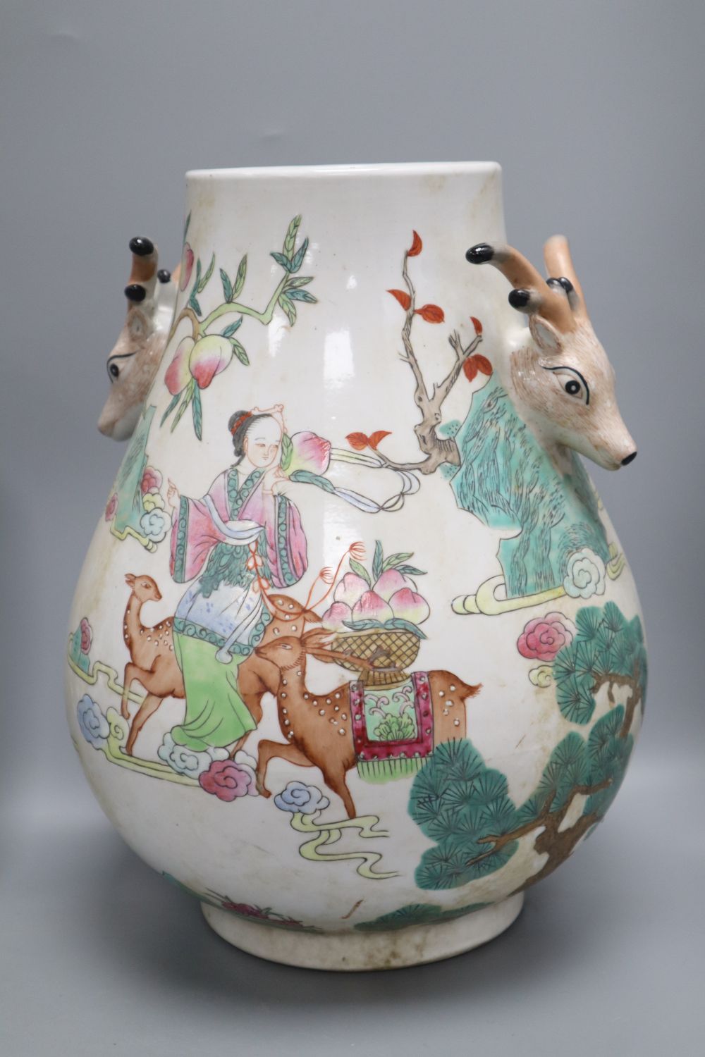 A Chinese vase with deer handles, height 29cm, a Chinese export blue and white plate and a tureen